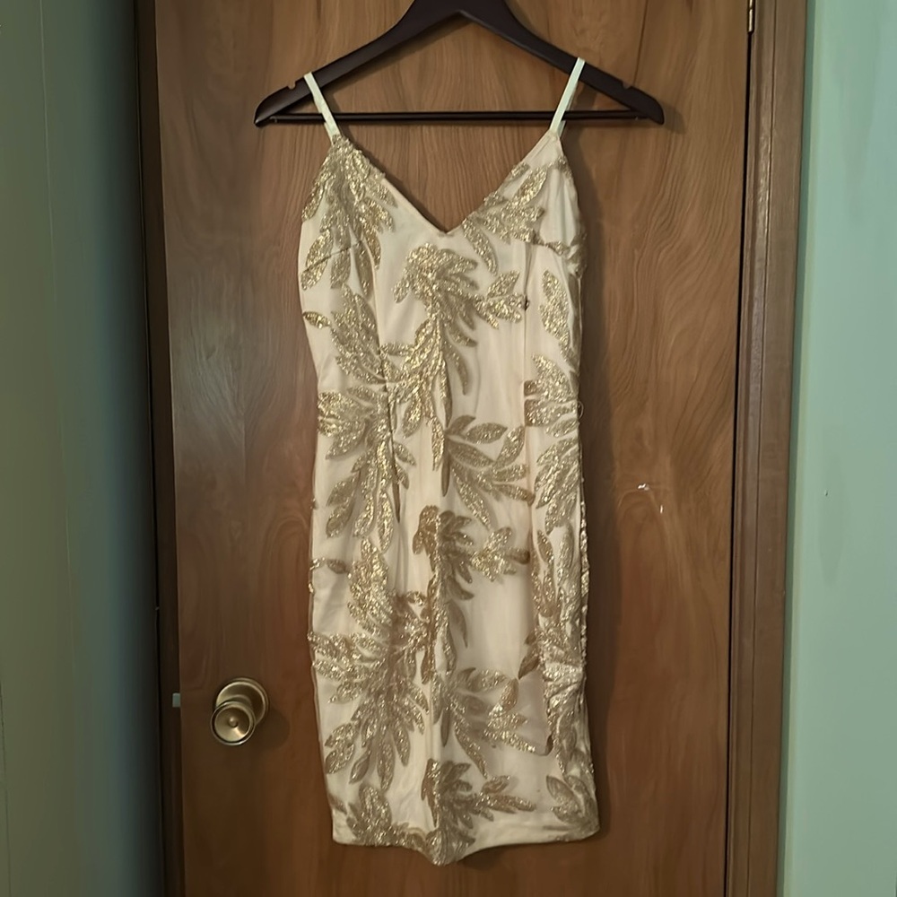 Golden party dress size M. Never worn